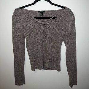Long Sleeve Shirt with a cut in the middle that you can adjust to your liking.😉